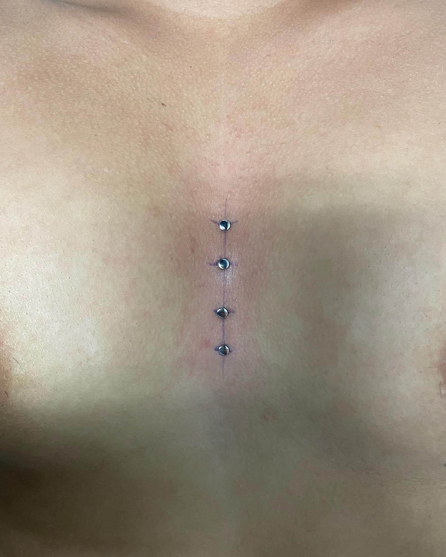 Double Chest Surface — surface piercing